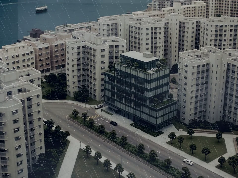A harbour neighbourhood in heavy wind-driven rain, with dark wet streets and trees swaying around Central Studio.
